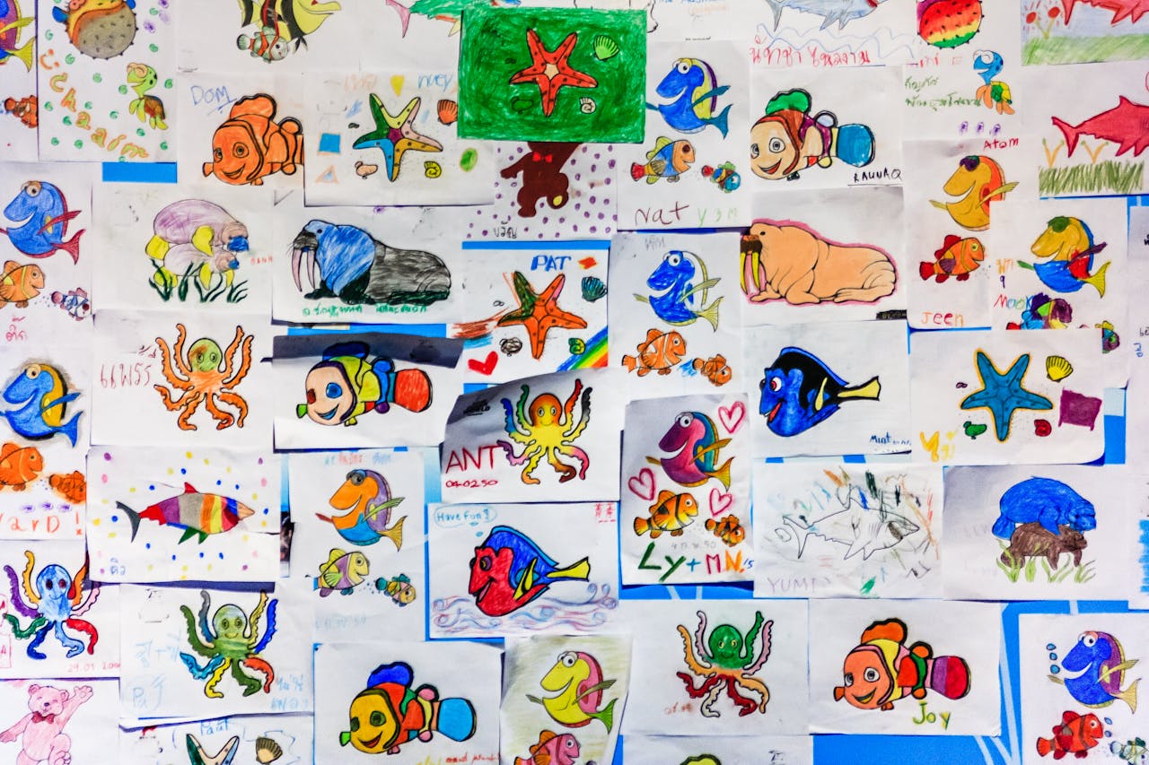 The Art of Drawing Readers In: Your attractive post title goes here A colorful collage of childrens drawings featuring various marine life in vibrant hues.
